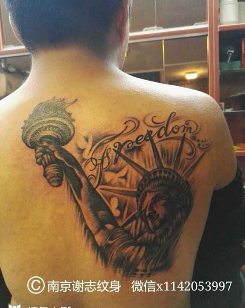 自由女神纹身图片_背部欧美人物原创成品纹身图案