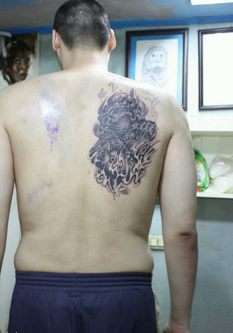 篮球明星唐正东的唐狮子纹身图片