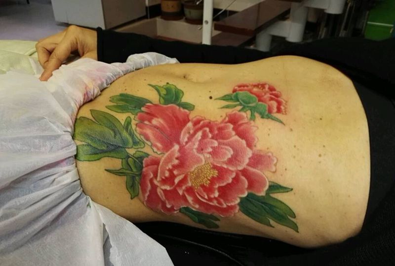 胎记遮盖纹身图片_腰部传统植物原创成品纹身图案