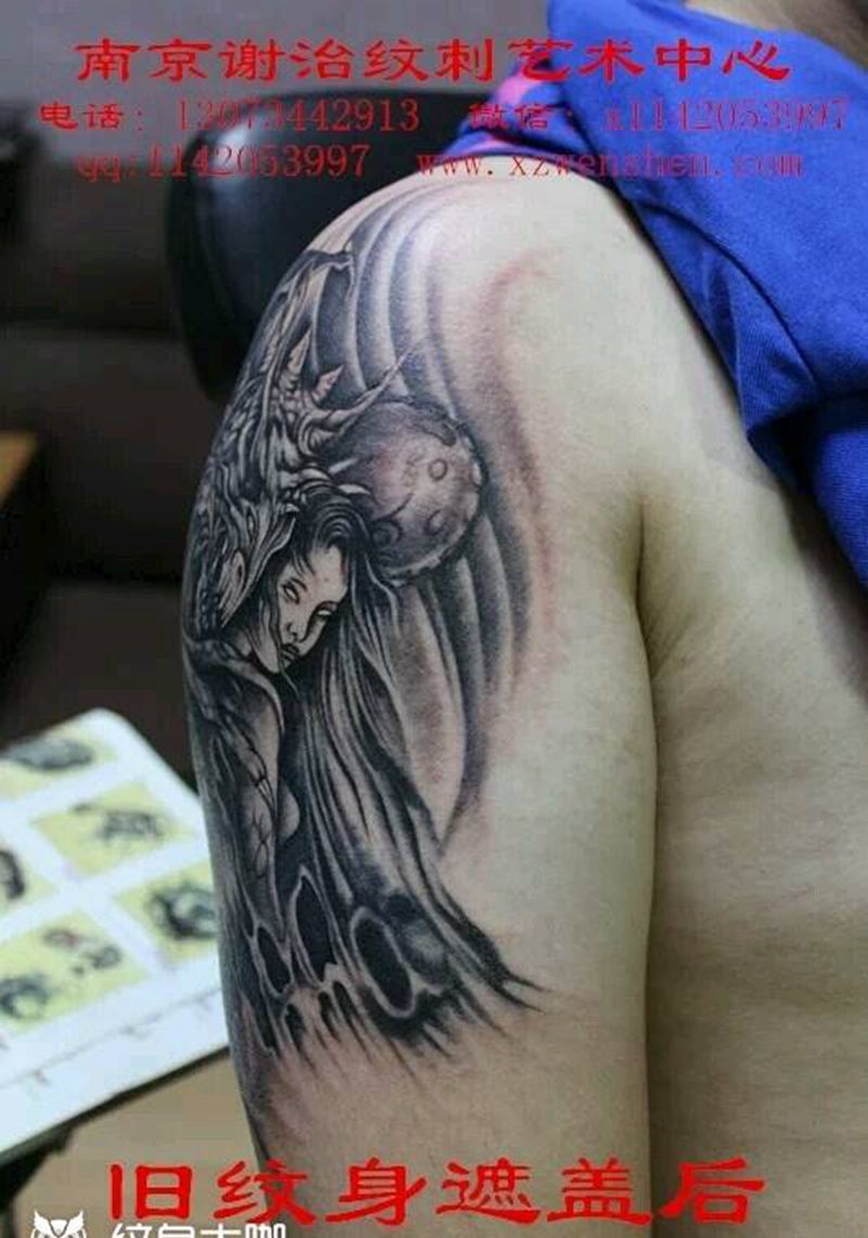 恶魔与美女纹身图片_手臂传统鬼神宗教原创成品纹身图案