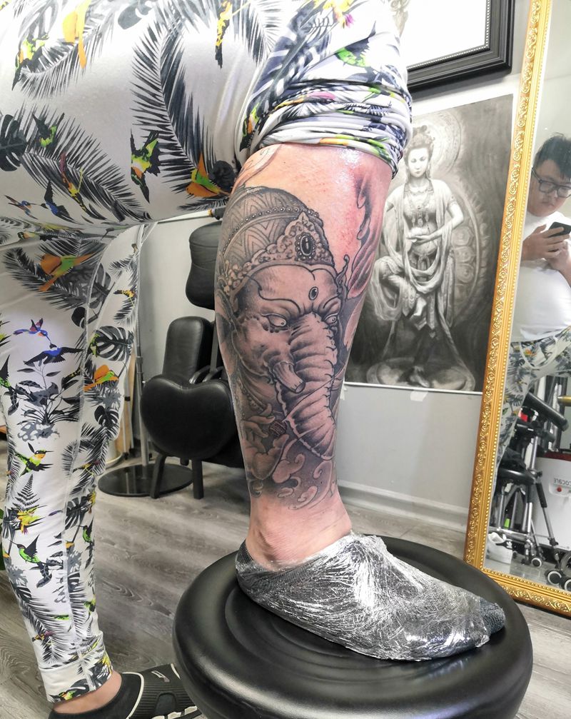 包小腿象神纹身图片_腿部新传统纹身图案