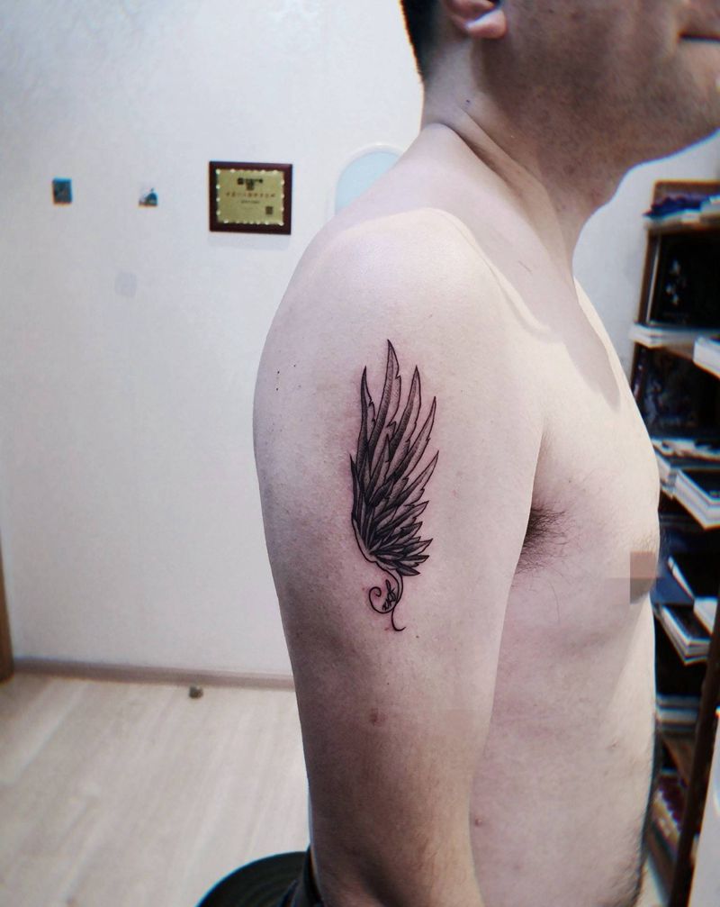 翅膀纹身图片_手臂点刺翅膀纹身图案