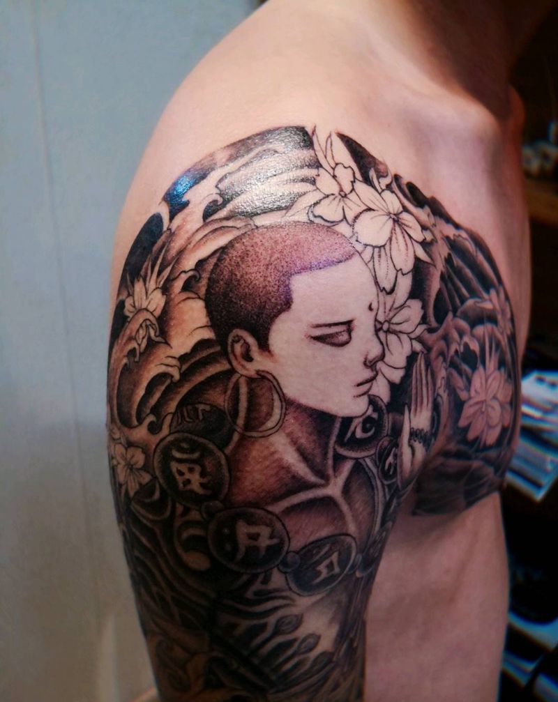 达摩半甲纹身图片_手臂胸部点刺半甲达摩纹身图案