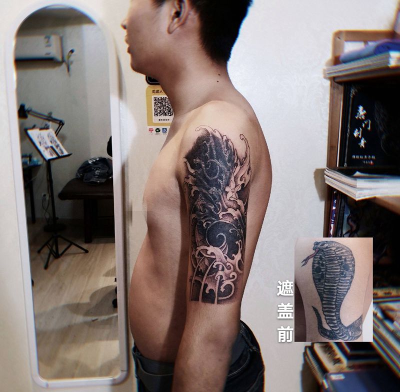 浪花遮盖大臂图纹身图片_手臂点刺遮盖大臂图云浪纹身图案