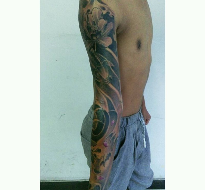 浪花鱼花臂纹身图片