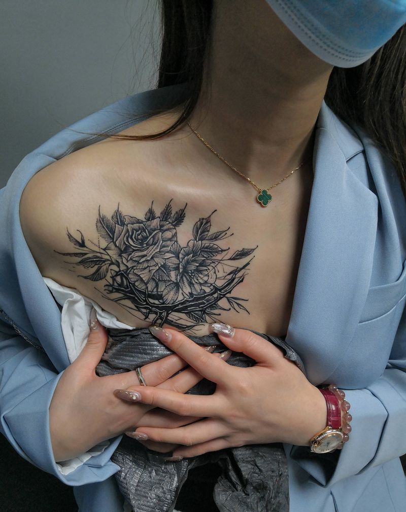 素花遮盖纹身图片_胸部点刺纹身图案