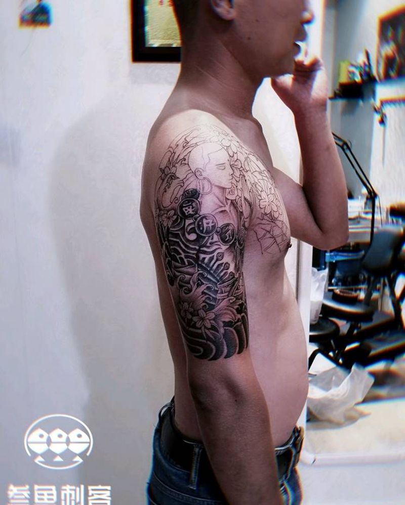 半甲达摩纹身图片_手臂半甲达摩纹身图案