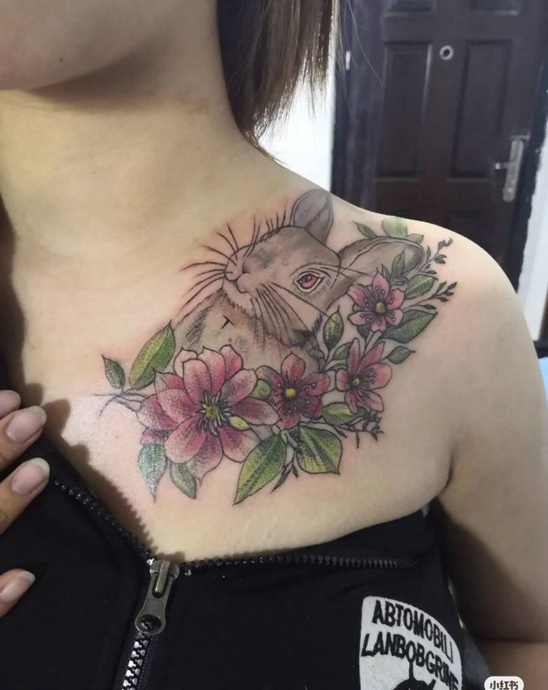 萌兔与彩色素花，顺便遮盖旧纹身纹身图片_胸部欧美写实纹身图案