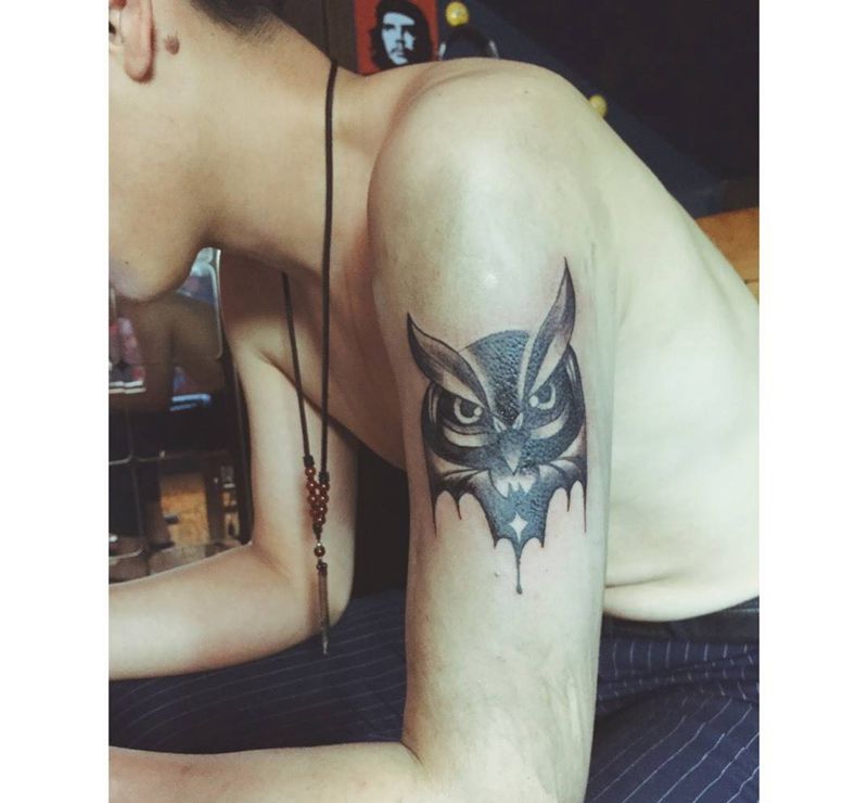 手臂猫头鹰纹身图片