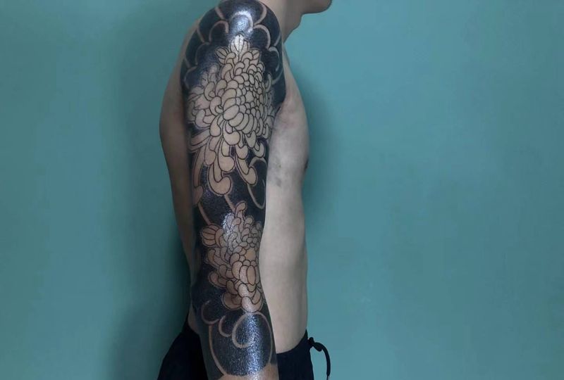 圆三七分袖纹身图片_手臂纹身图案