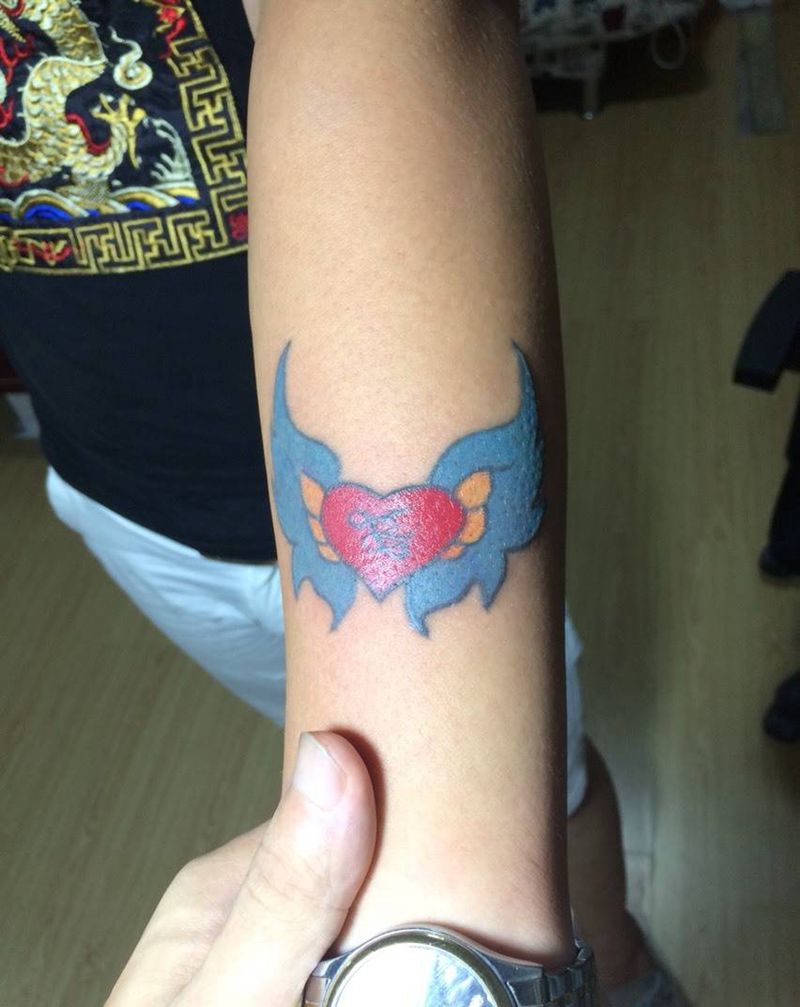 给心插上翅膀纹身图片