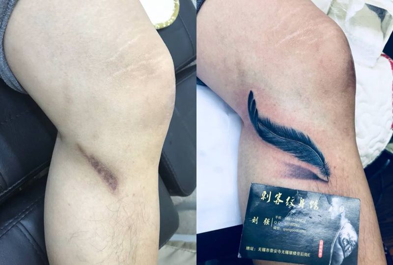 羽毛遮盖疤痕纹身图片
