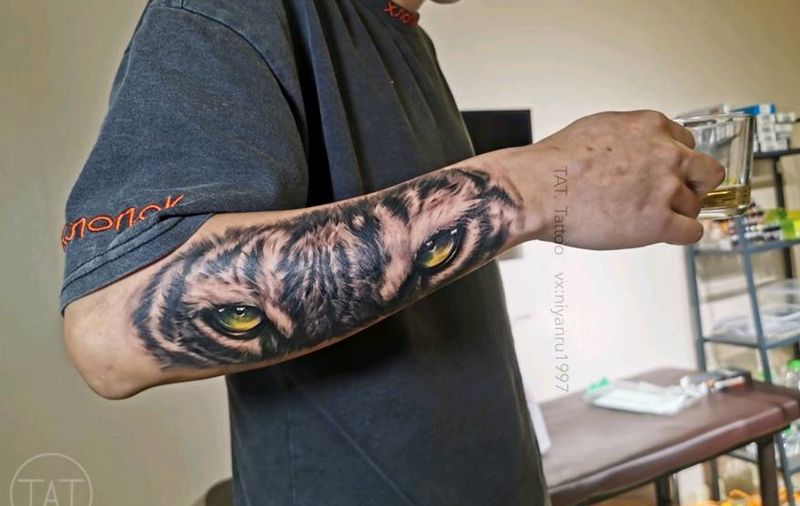 写实老虎作品纹身图片_手臂欧美写实老虎纹身图案