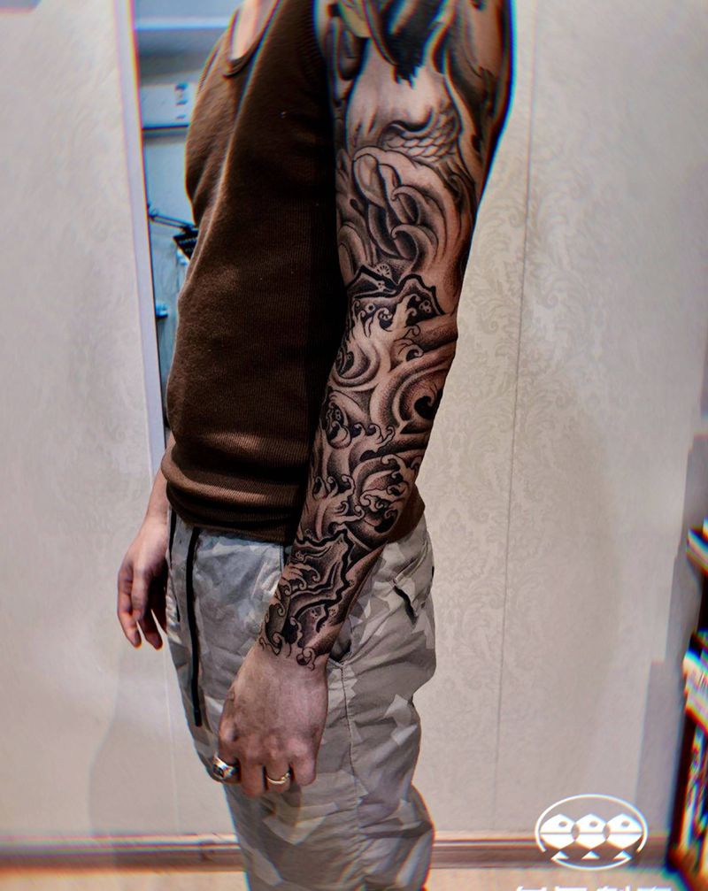 包小臂恢复纹身图片_手臂点刺包小臂浪花纹身图案