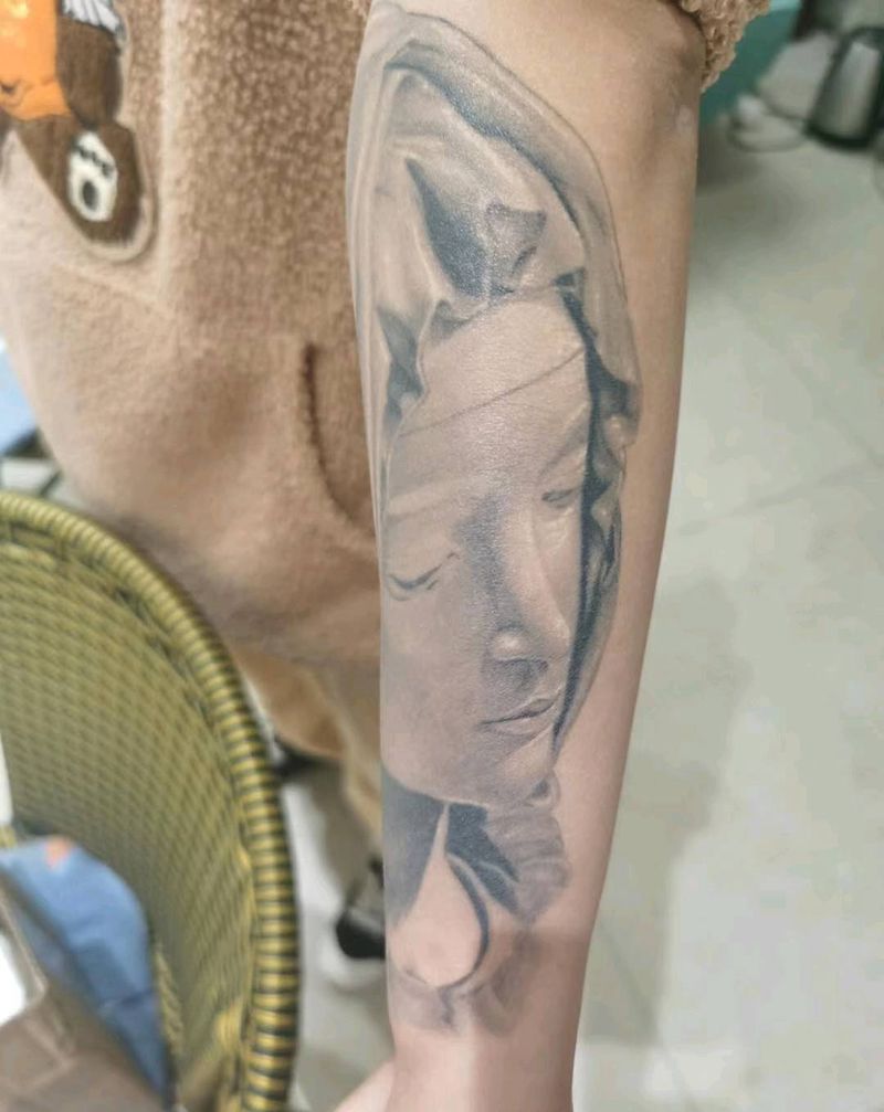 圣母恢复后效果纹身图片_手臂欧美写实纹身图案