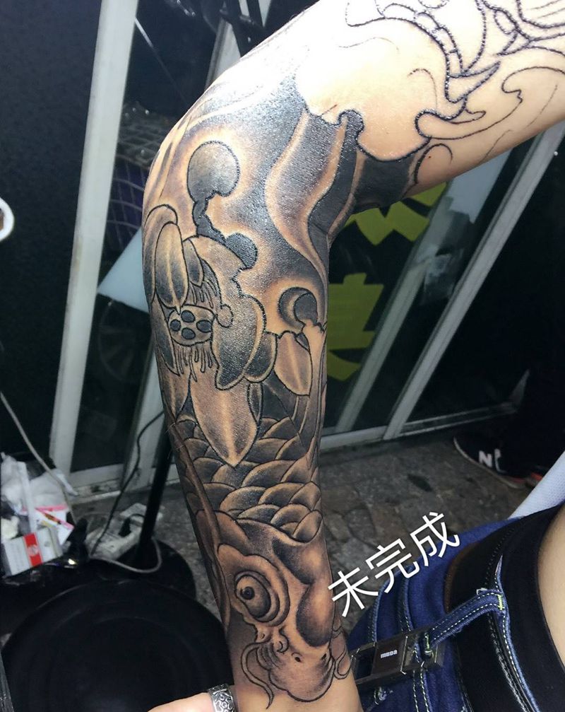 小臂鲤鱼纹身图片