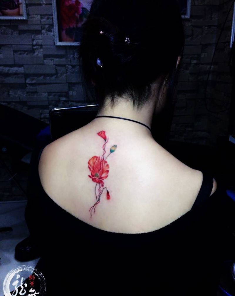 铮铮硬骨绽花开纹身图片_成品颈部清新原创纹身图案