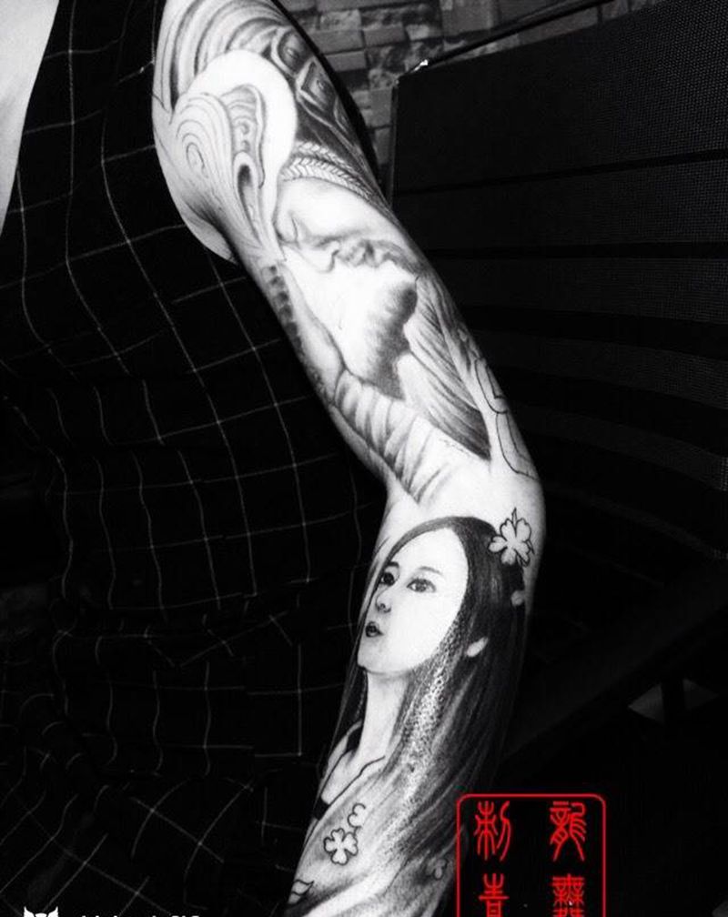 铁骨柔情纹身图片_手臂原创人物肖像未完成纹身图案