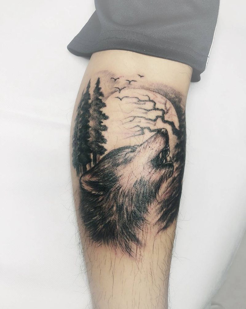 狼啸天纹身图片_腿部欧美写实纹身图案