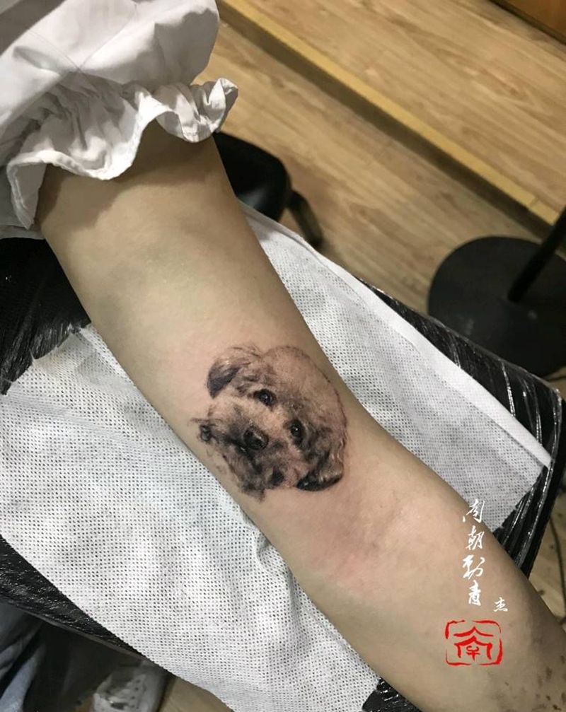 小狗纹身图片_手臂欧美写实纹身图案