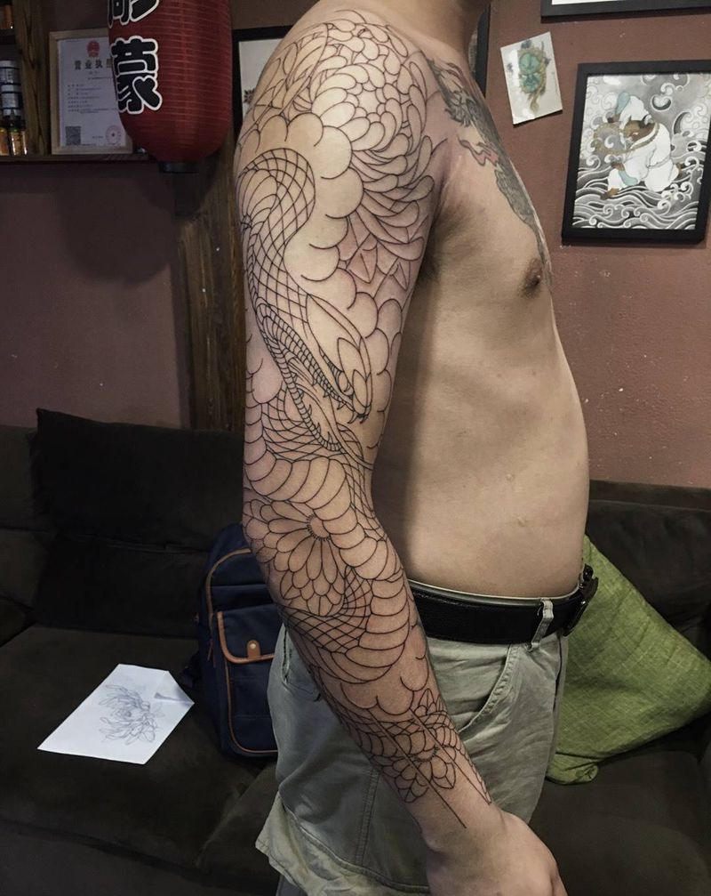 蛇菊花花臂纹身图片