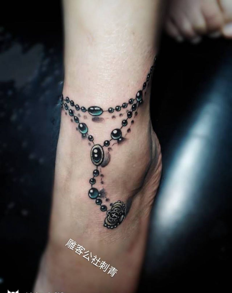 脚链纹身图片_脚部欧美写实纹身图案