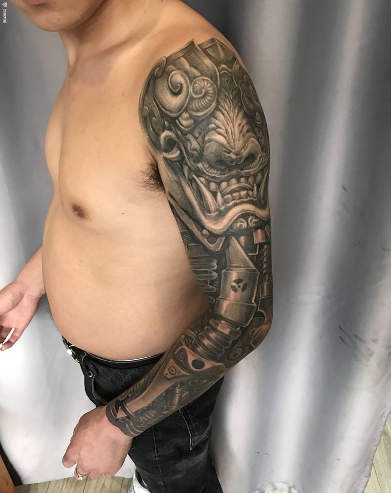 机械石雕纹身图片_手臂欧美写实纹身图案