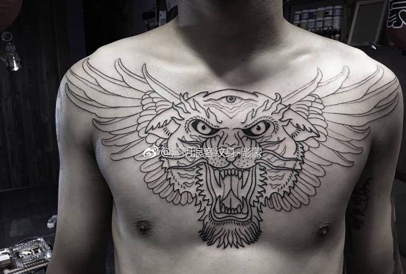 花胸虎头纹身图片_欧美纹身图案