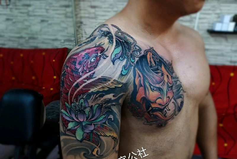 半胛 鱼 般诺纹身图片_胸部手臂新传统纹身图案