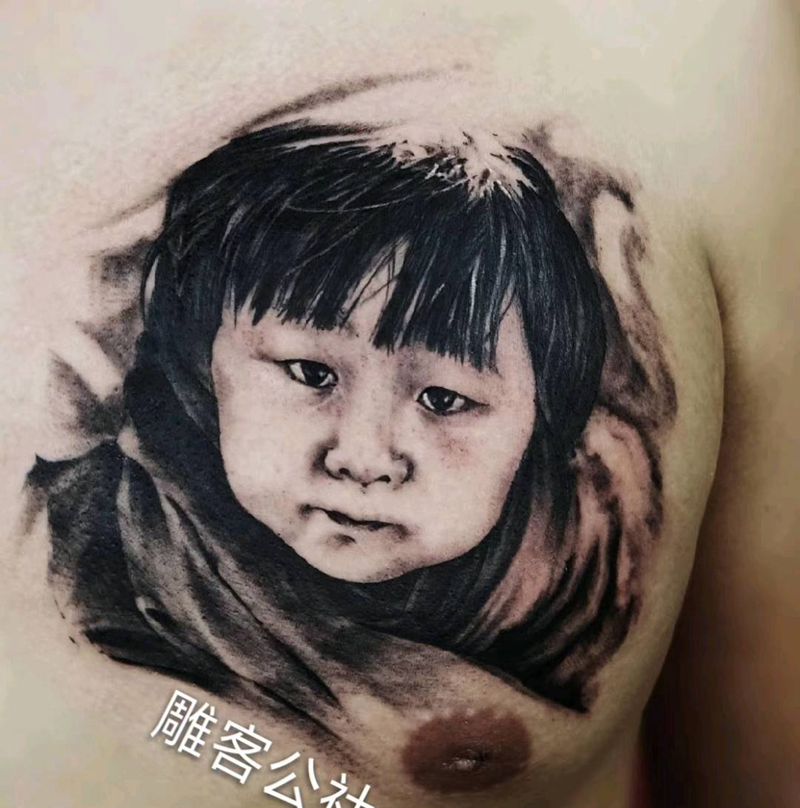 宝宝纹身图片_胸部欧美写实纹身图案