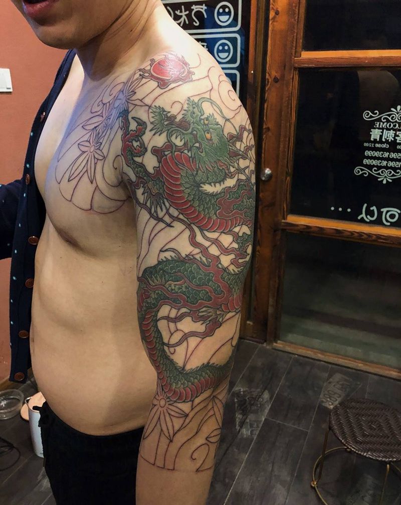 半甲花臂纹身图片