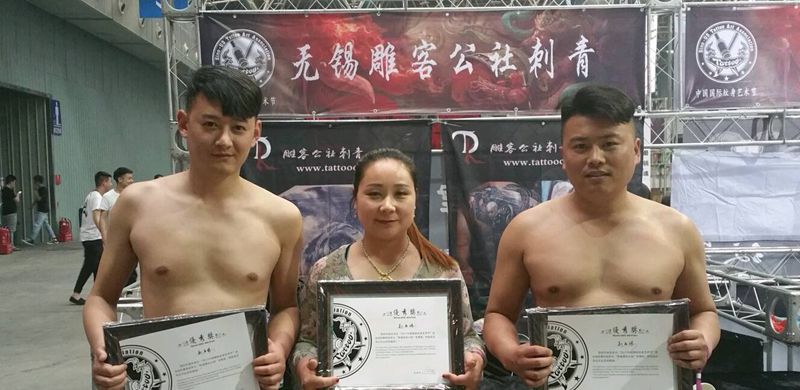 廊坊国际比赛纹身图片_背部写实人物纹身图案