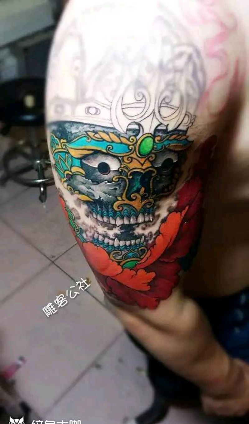 嘎巴拉+唐狮纹身图片_手臂背部新传统纹身图案
