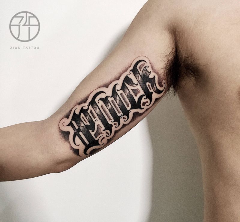 花体字纹身图片_手臂纹身图案