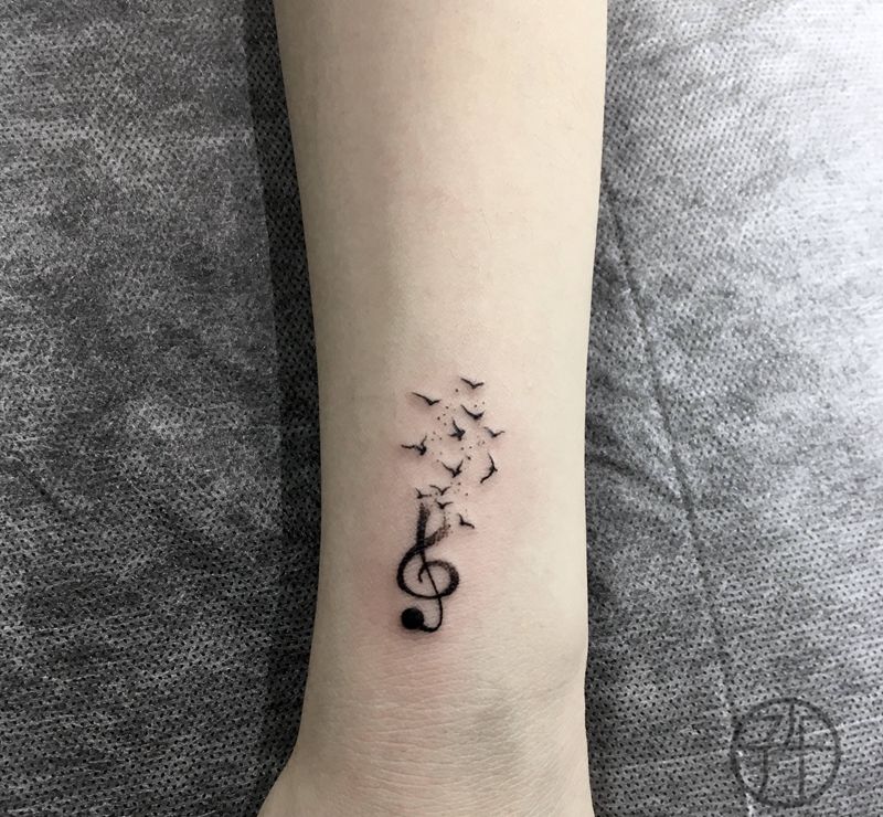 音符纹身图片_手臂纹身图案