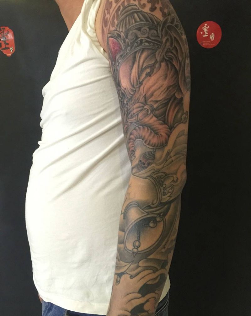 象神牡丹花臂纹身图片