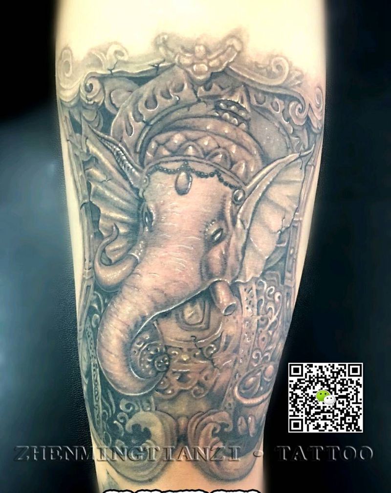 石雕象神纹身图片