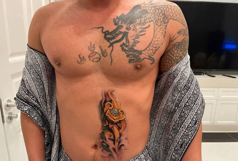 给大哥设计个疤痕遮盖玉如意吧纹身图片_腹部新传统纹身图案