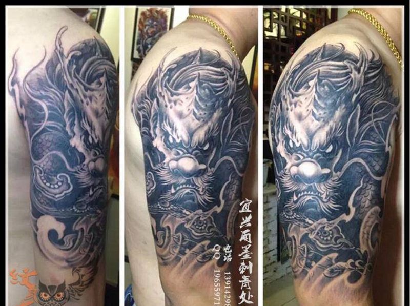 麒麟纹身图片_雨墨刺青宜兴无锡.常州手臂原创传统写实清新动物纹身图案