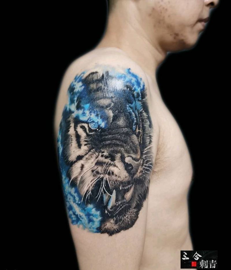 伥虎纹身图片_手臂欧美写实纹身图案