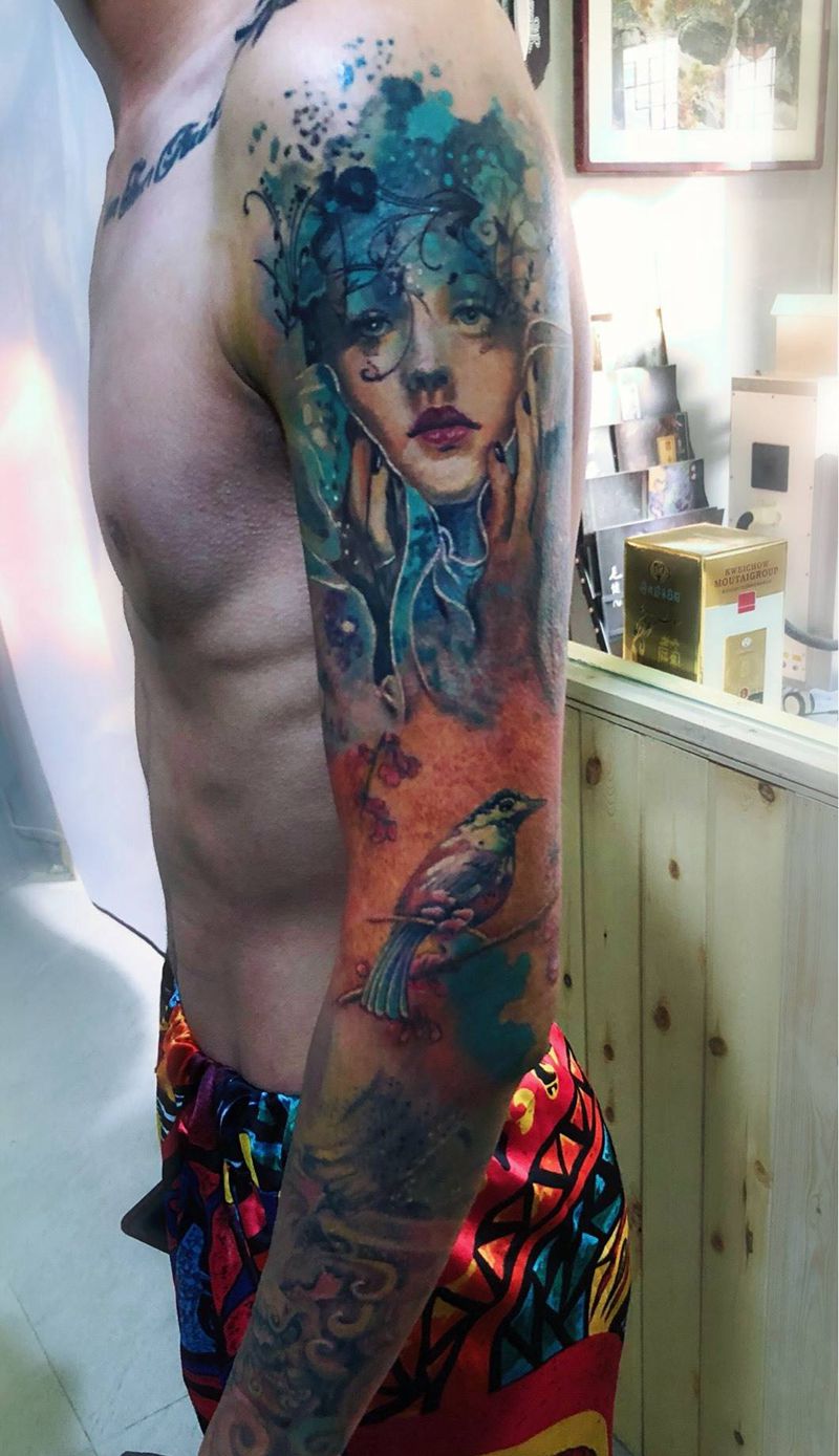 泼墨花臂纹身图片