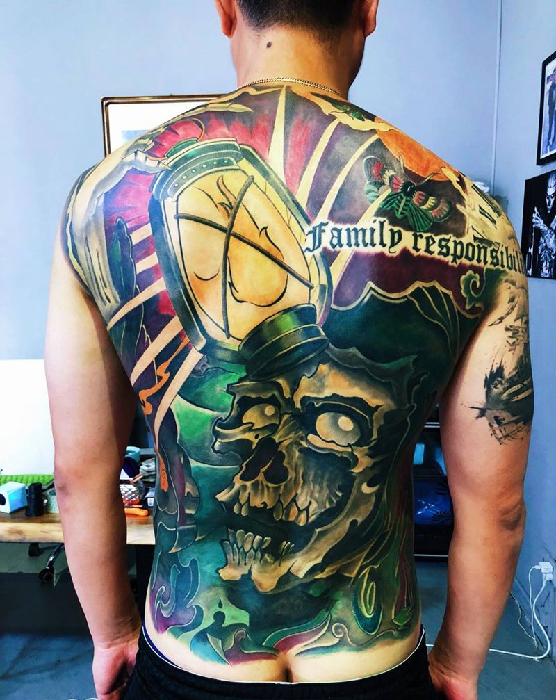 骷髅擎灯纹身图片