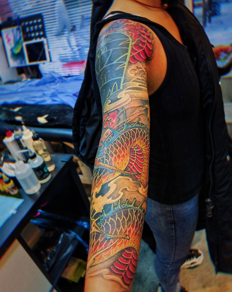 花臂包图腾纹身图片_手臂新传统纹身图案