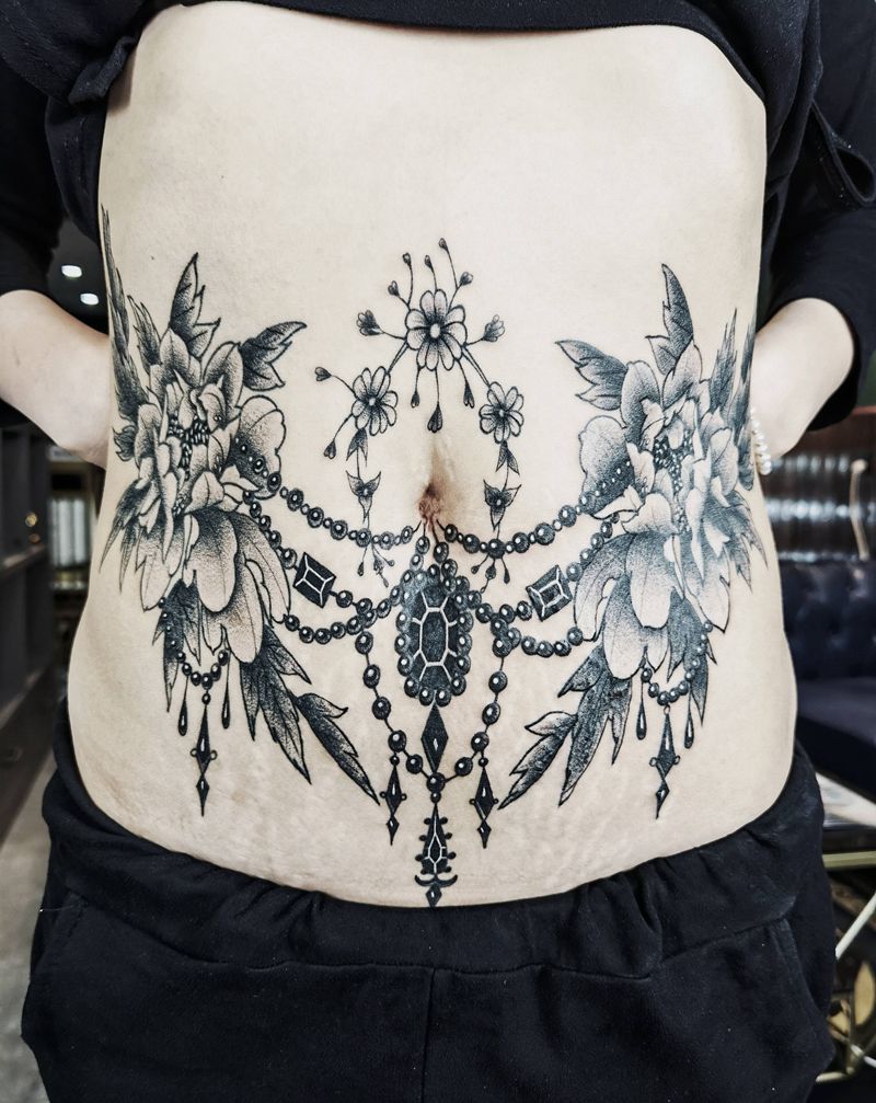 素花盖妊辰纹纹身图片_腹部点刺纹身图案