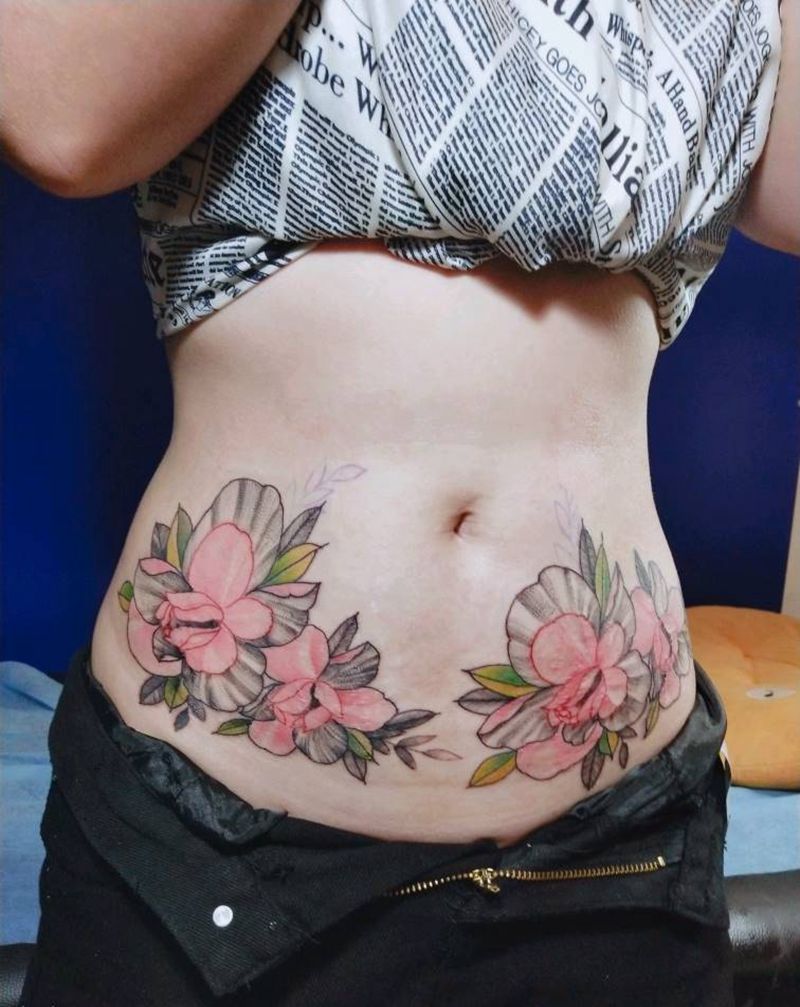 素华遮盖妊振纹纹身图片_腹部纹身图案