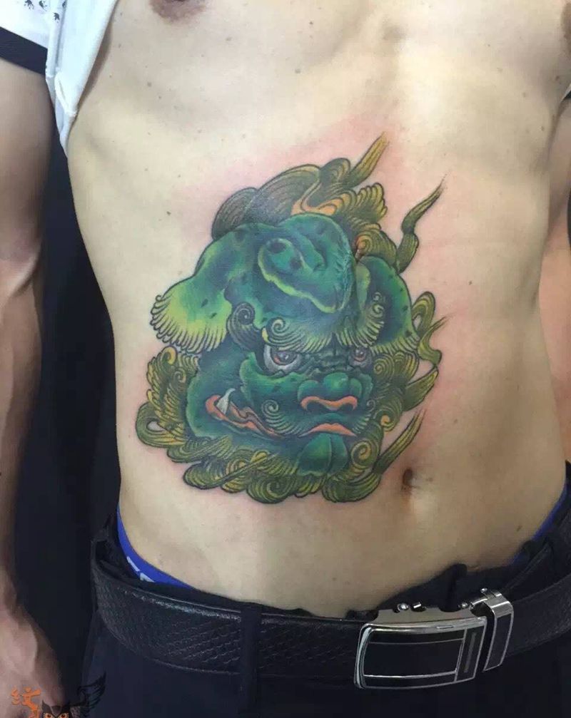 唐狮纹身图片_无锡.宜兴雨墨刺青常州腹部动物传统纹身图案