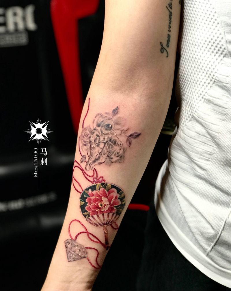 扇纹身图片_手臂纹身图案