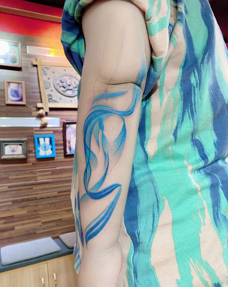 泼墨纹身图片_手臂纹身图案