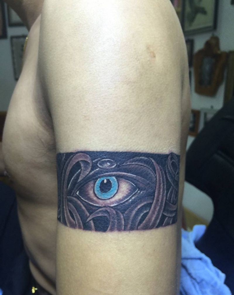 眼睛臂环纹身图片