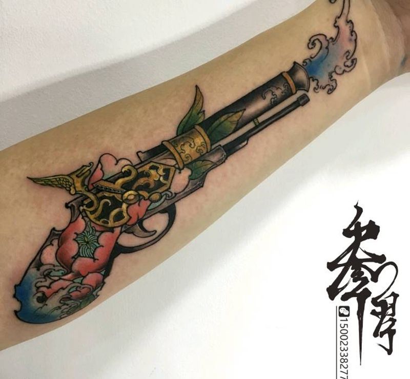 传统滋水枪 哈哈纹身图片